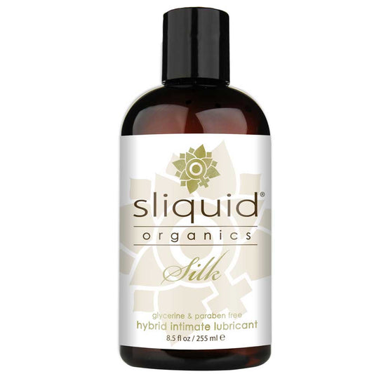 Bottle of Sliquid Organics Silk Hybrid Lube with a white and green label, indicating it is a hybrid intimate lubricant, 8.5oz in size, with organic ingredients.