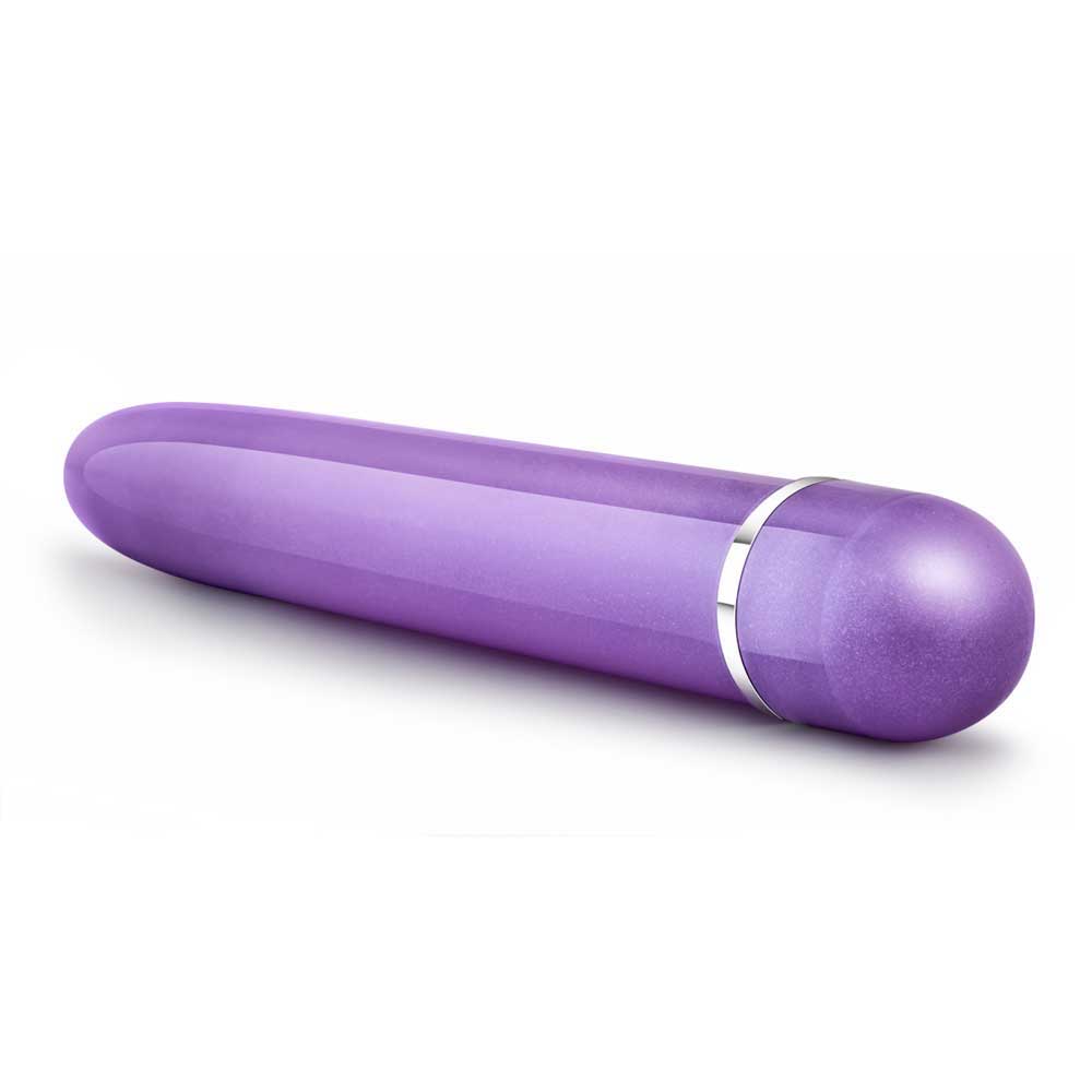 A purple Slimline Vibe by Blush Novelties out of the package on a white background. shows the controler end