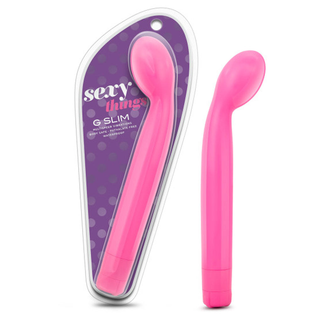 Picture d a pink g spot vibrator in a pink package on a white background. Next to the package is the vibrator out of its package.