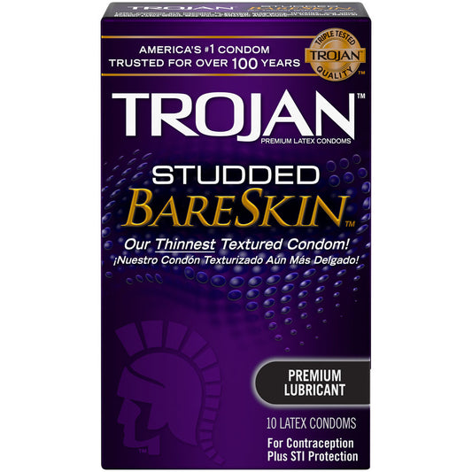 Packaging for Trojan Studded Bareskin condoms featuring a purple and black design with product information and branding.