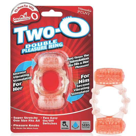 The image shows a red and transparent vibrating cock ring, packaged in a product box. The ring has two pleasure knobs and is designed for dual stimulation.