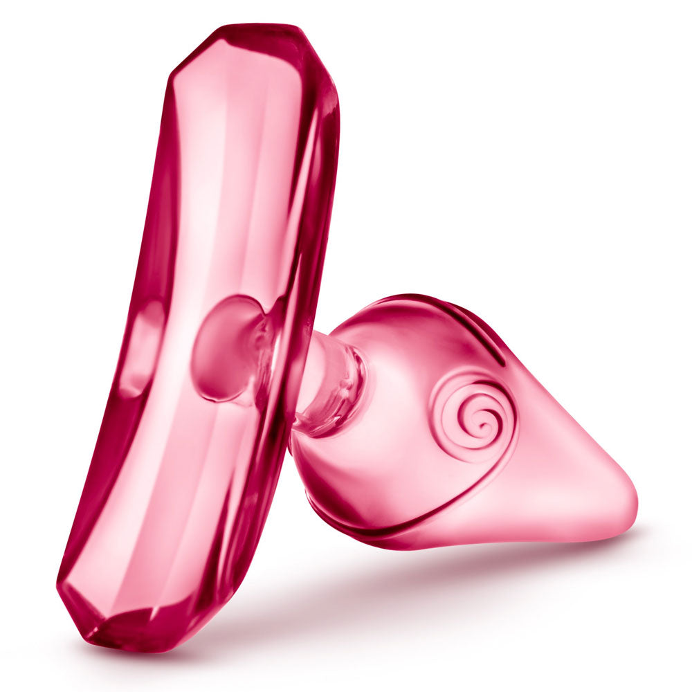 Clear anal plug on a white background