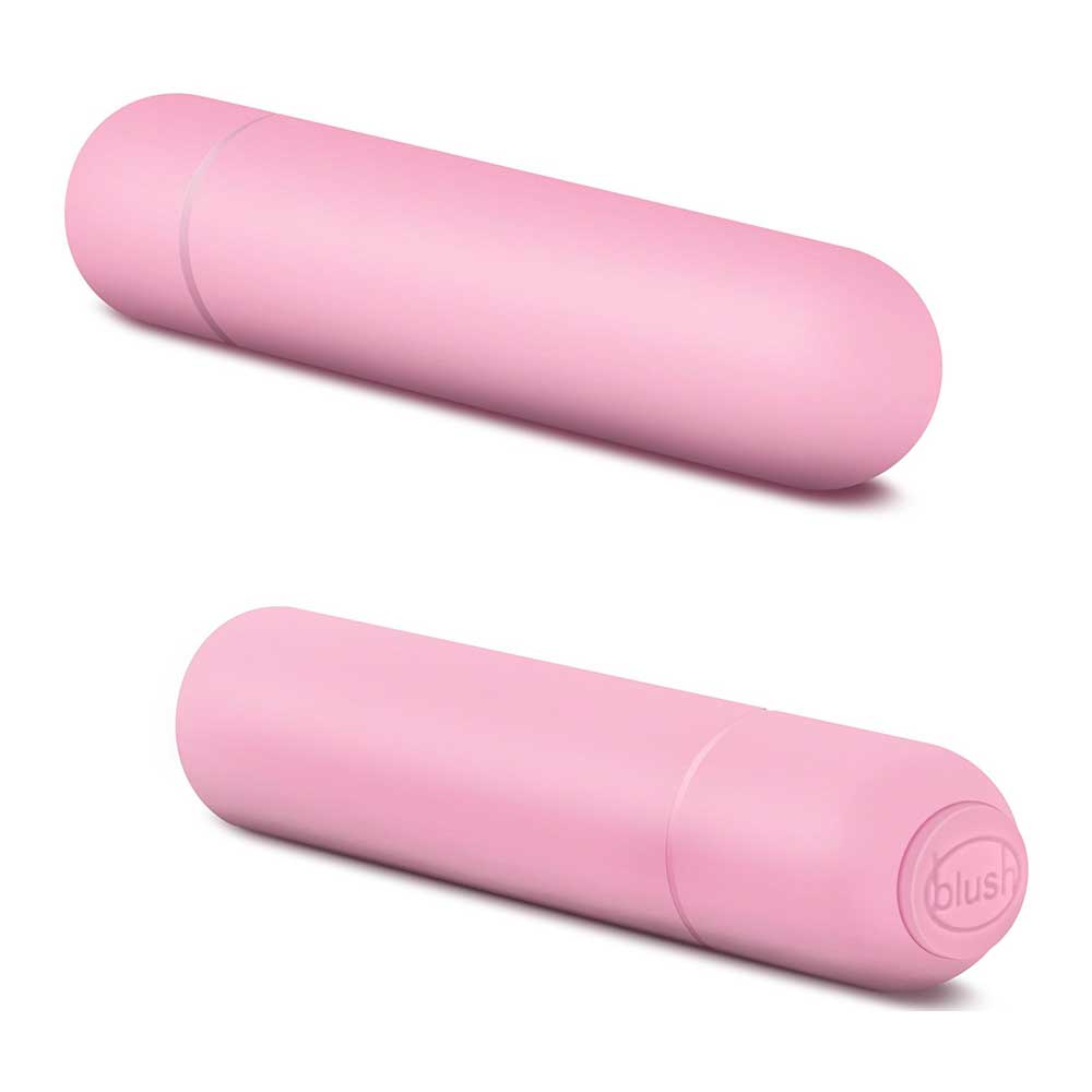 A small, pink bullet vibrator displayed out of its packaging on a white background