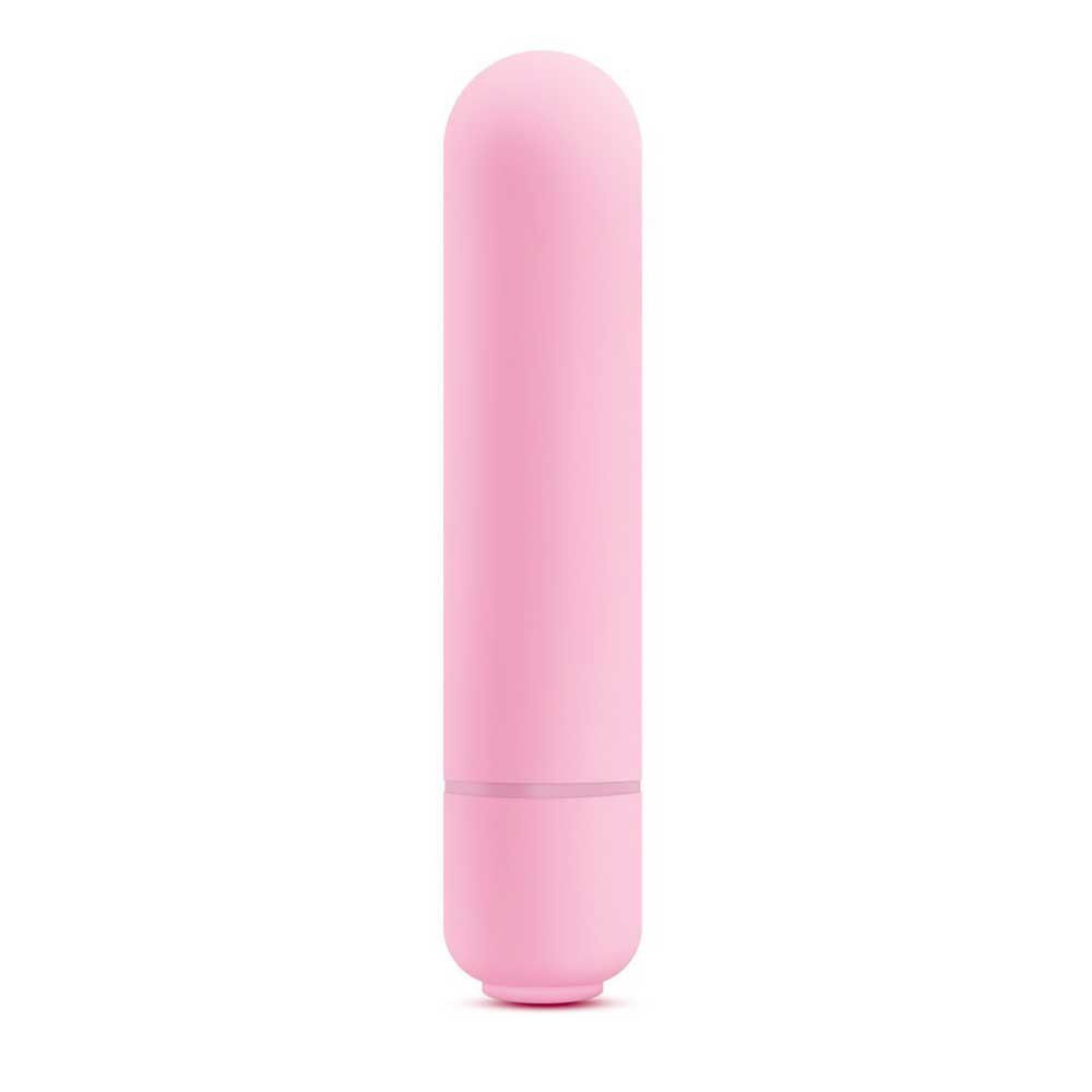 A small, pink bullet vibrator displayed out of its packaging on a white background