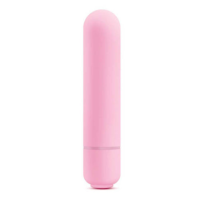A small, pink bullet vibrator displayed out of its packaging on a white background