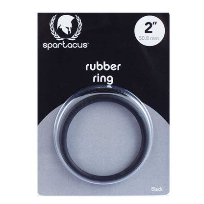 A black rubber cock ring labeled 'Spartacus' is displayed on a package, indicating a snug fit for controlling ejaculation and enhancing performance.