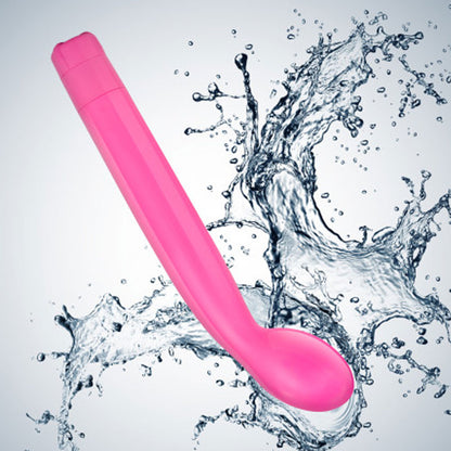 A pink G-slim vibrator with a curved tip and a deep handle, shown in a water splash, indicating its waterproof feature.