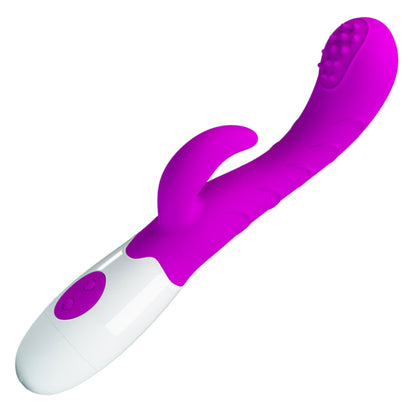 A purple and white rabbit style vibrator with a rolling ball tip and an external extension for clitoral and G-Spot stimulation against a white background.