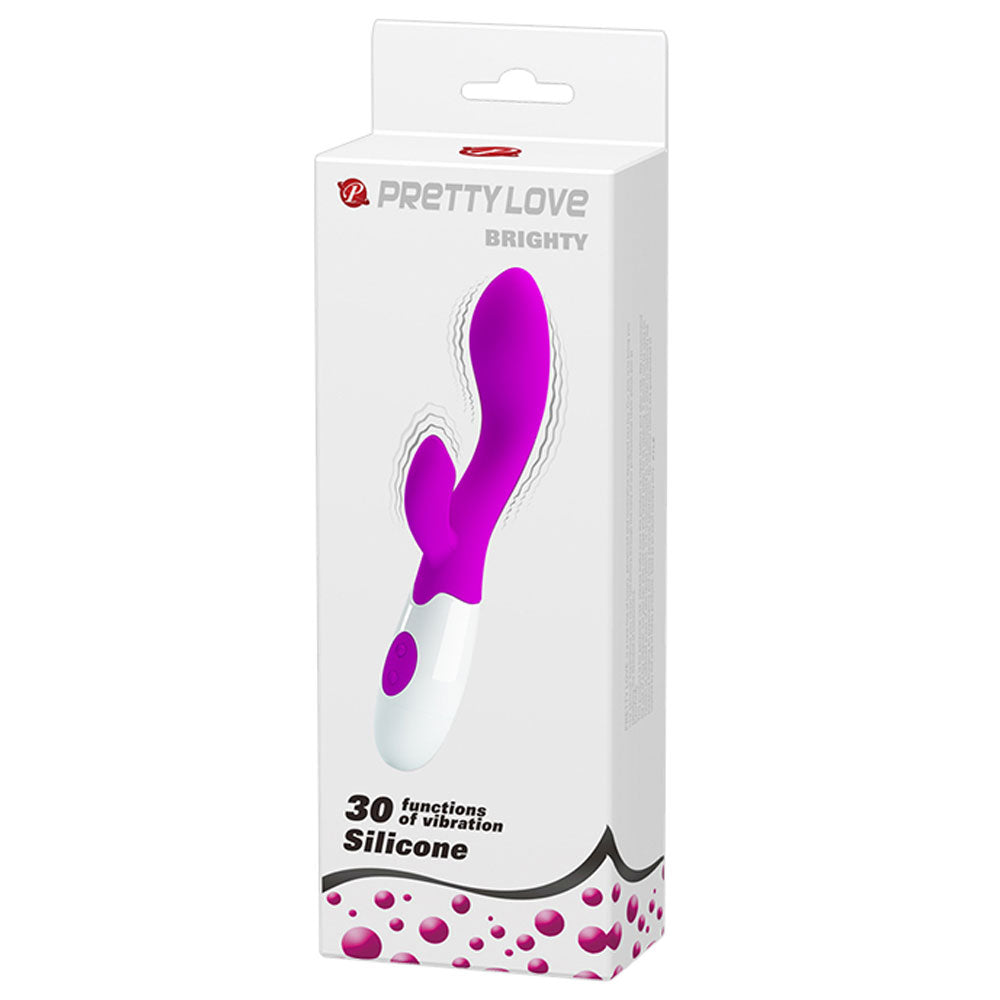 The product is a purple and white rabbit style vibrator with a rolling ball tip and an external extension for clitoral and G-Spot stimulation. It is shown in its white and pink packaging and has the brand name 'Pretty Love' on it. The model is named "Brighty".